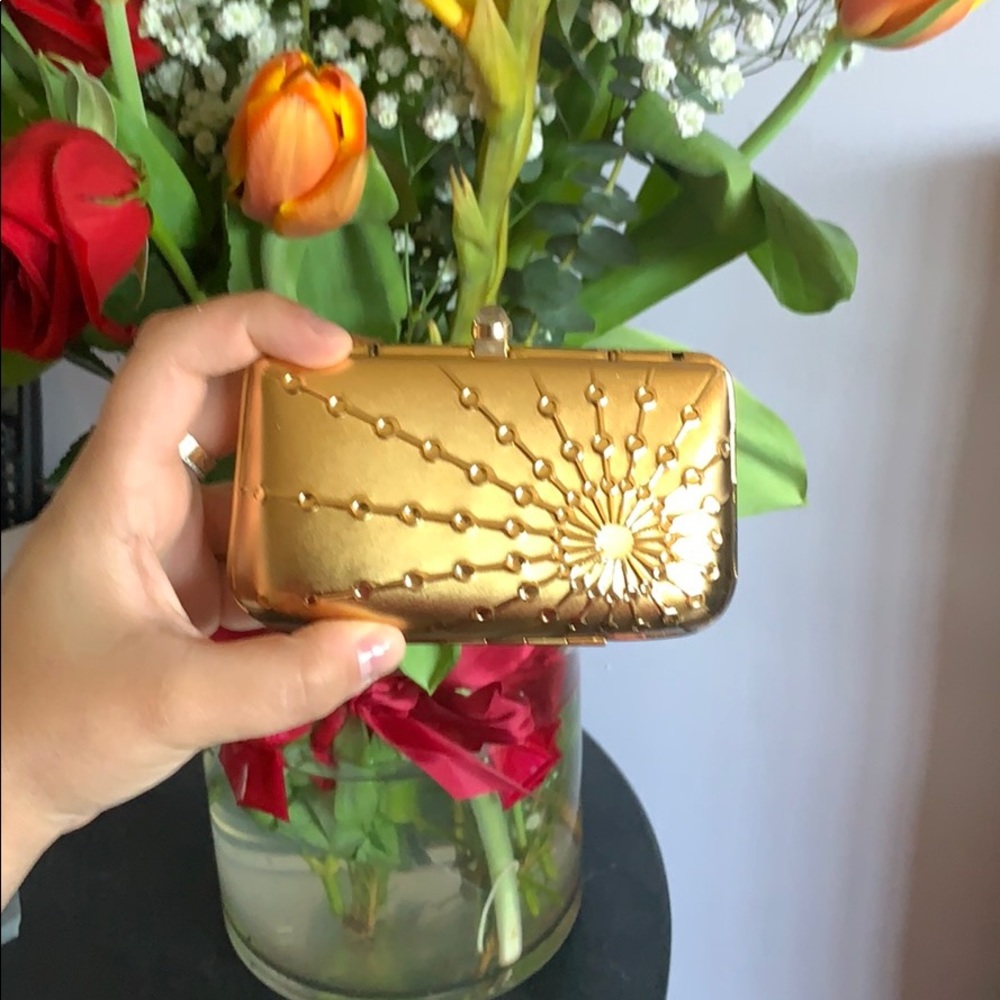 Gold clutch